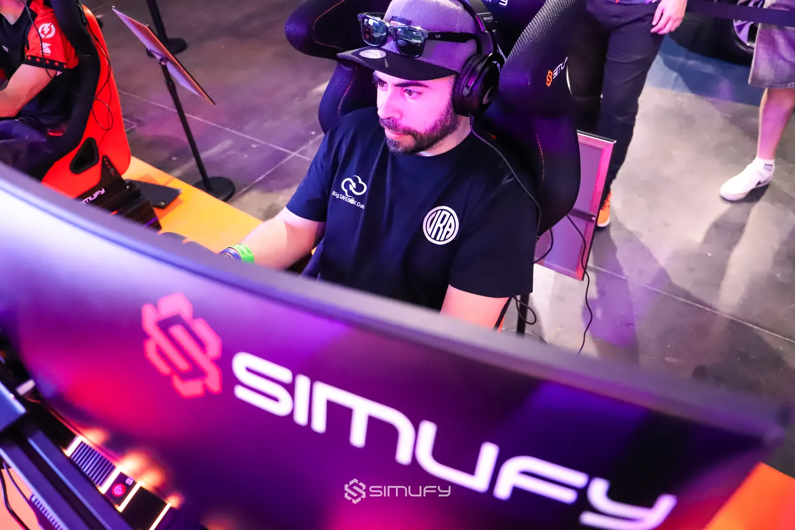 PhotoRacerTV compitiendo en un evento de simracing con Simufy